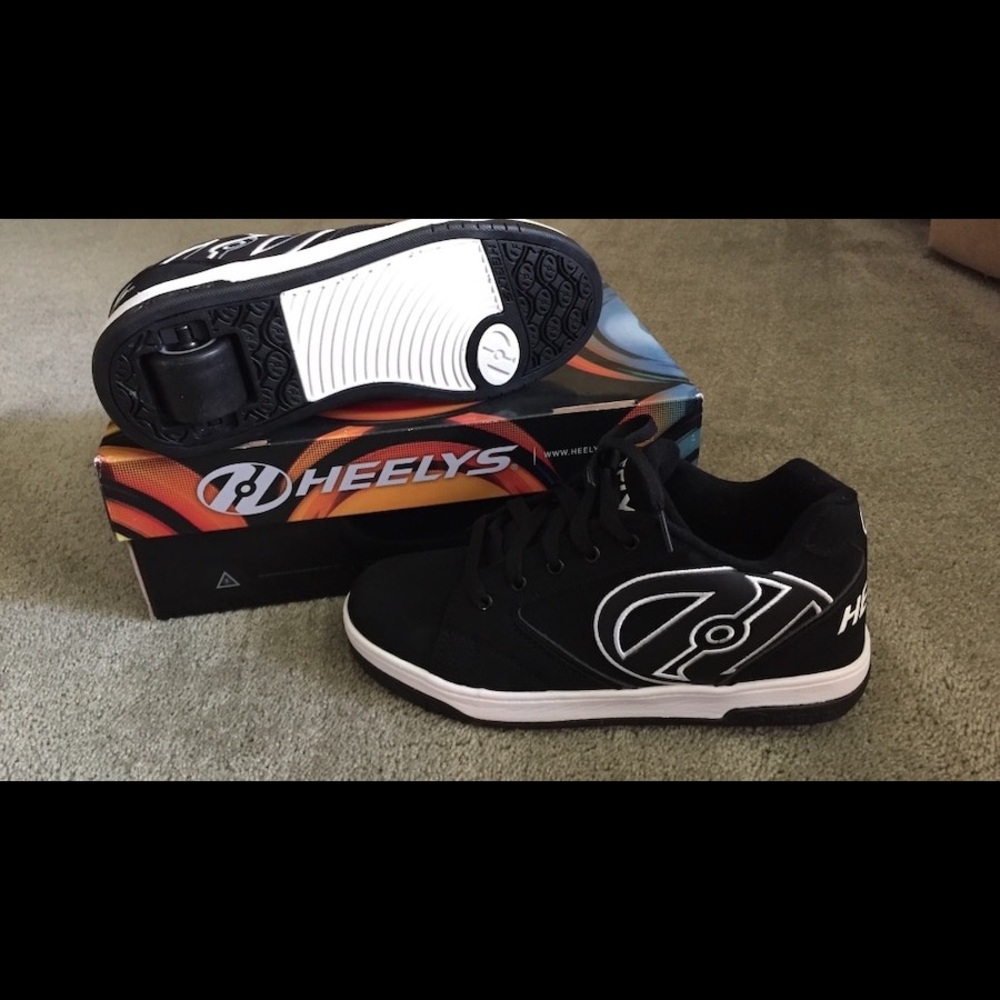 Heelys Boys Sneakers size 8. Brand new never worn.